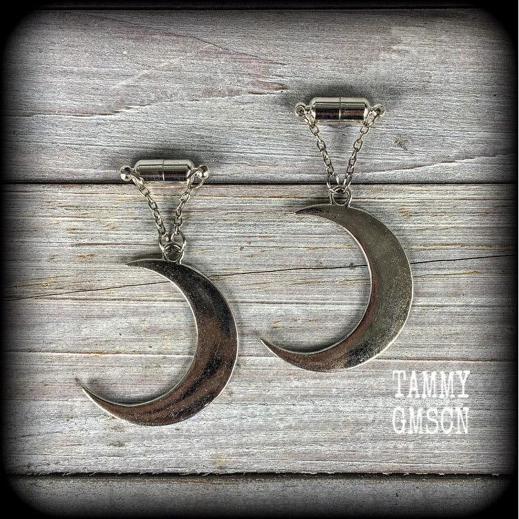 Crescent moon tunnel earrings