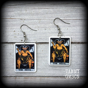 These earrings feature a lightweight Rider Waite ‘The Devil’ tarot card charm, measuring just over 6cms from tip to tip and weighing only a few grams each.

This pair has been made with stainless steel french hooks, for pierced ears.