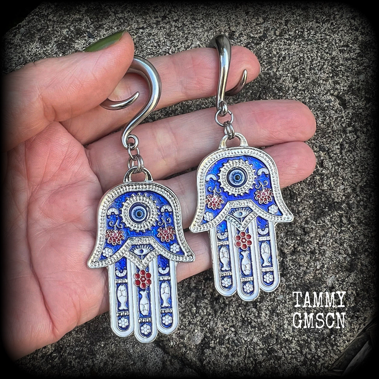 These gorgeous antique silver and enamel hamsa hand gauged earrings weigh approx 17 grams each, and measure just on 9cms from tip to tip, nice and dangly.

This pair have been made on 2 gauge (6mm) surgical steel full curl hooks, to be worn in stretched lobes.