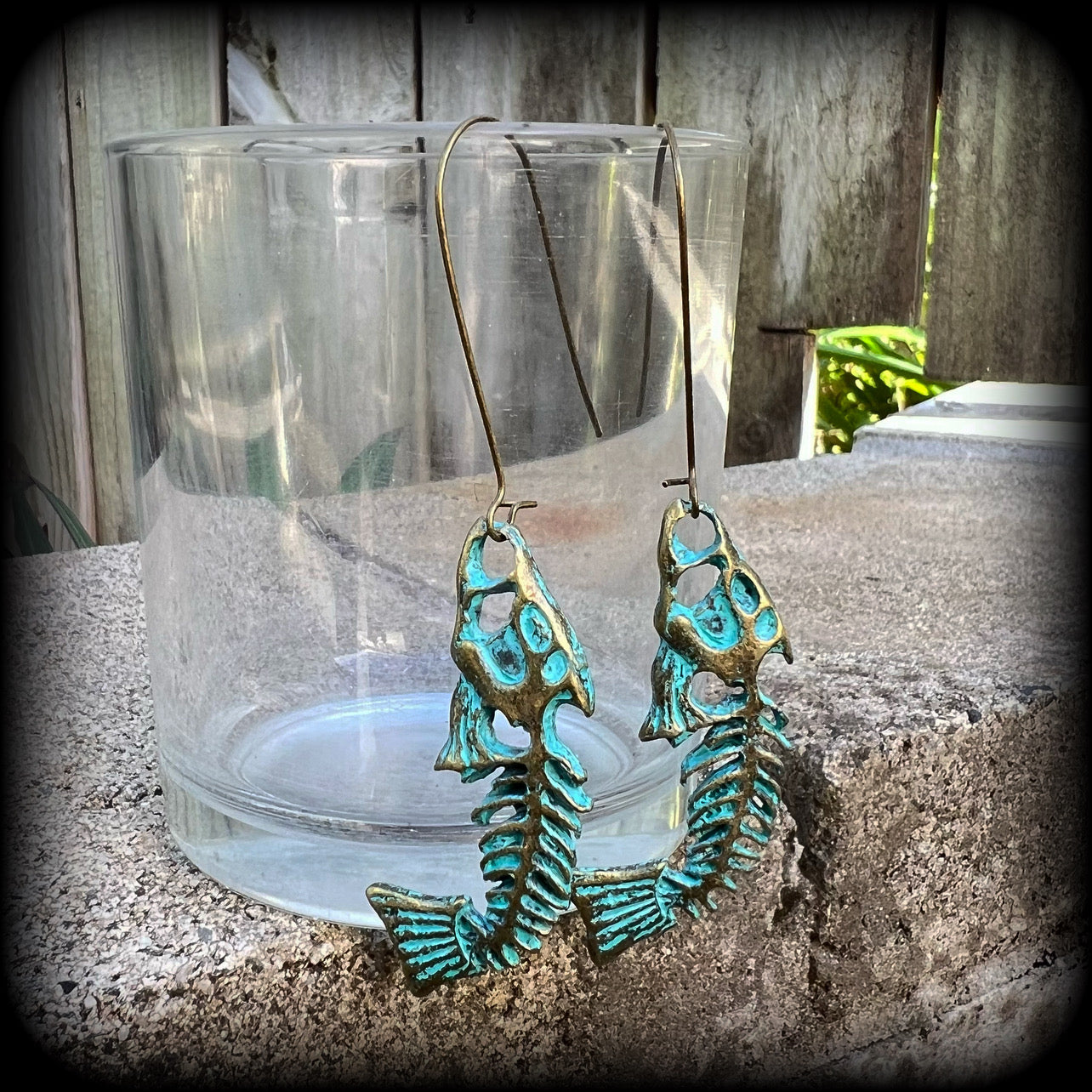 Patina fish skeleton earrings