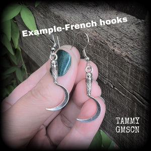 Featuring super cute super lightweight antique silver grim reaper scythes, these earrings are lovely and petite, measuring just under 5cms from tip to tip and weigh only a gram or two each.

This pair has been made with stainless steel french hooks, for pierced ears.