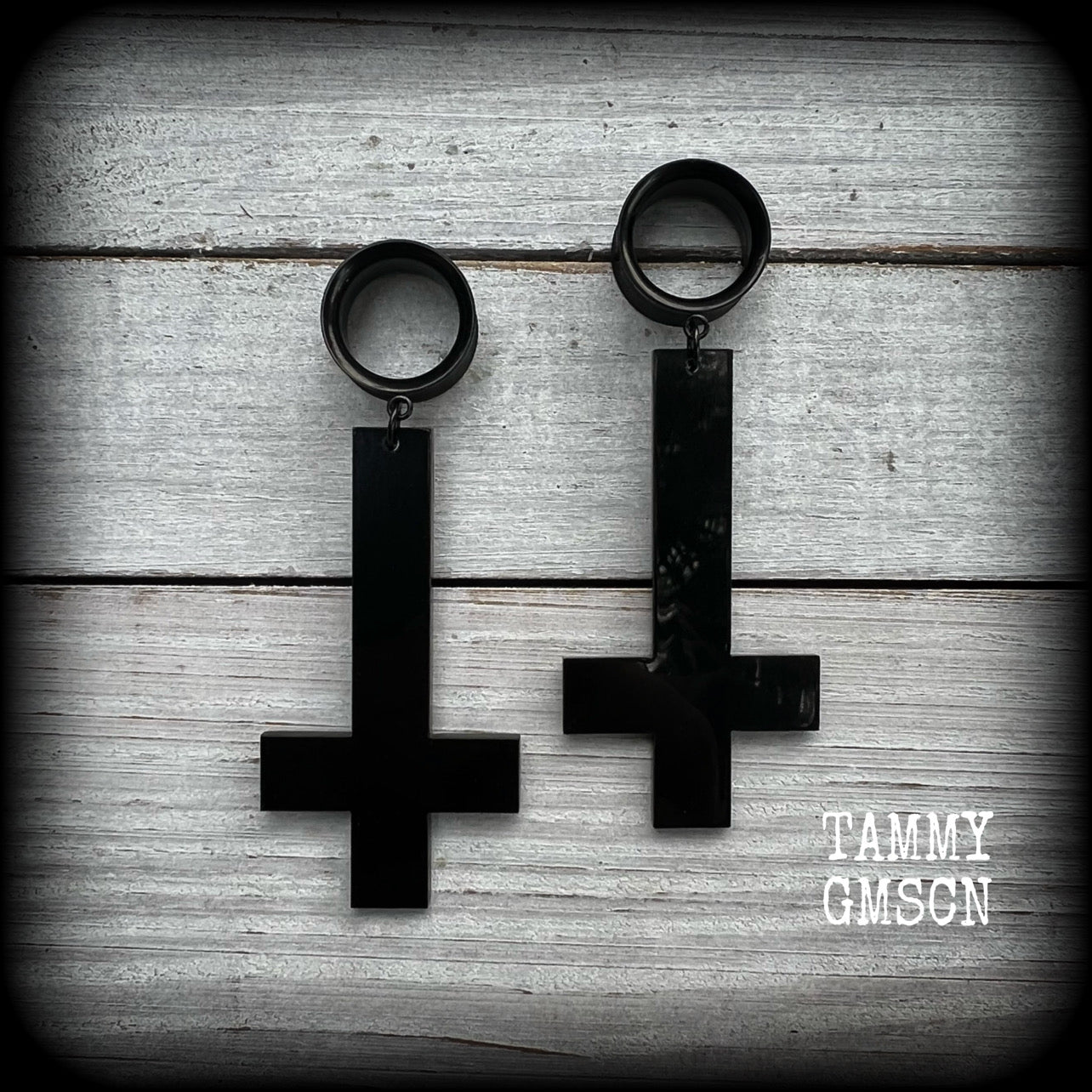Inverted cross tunnel earrings