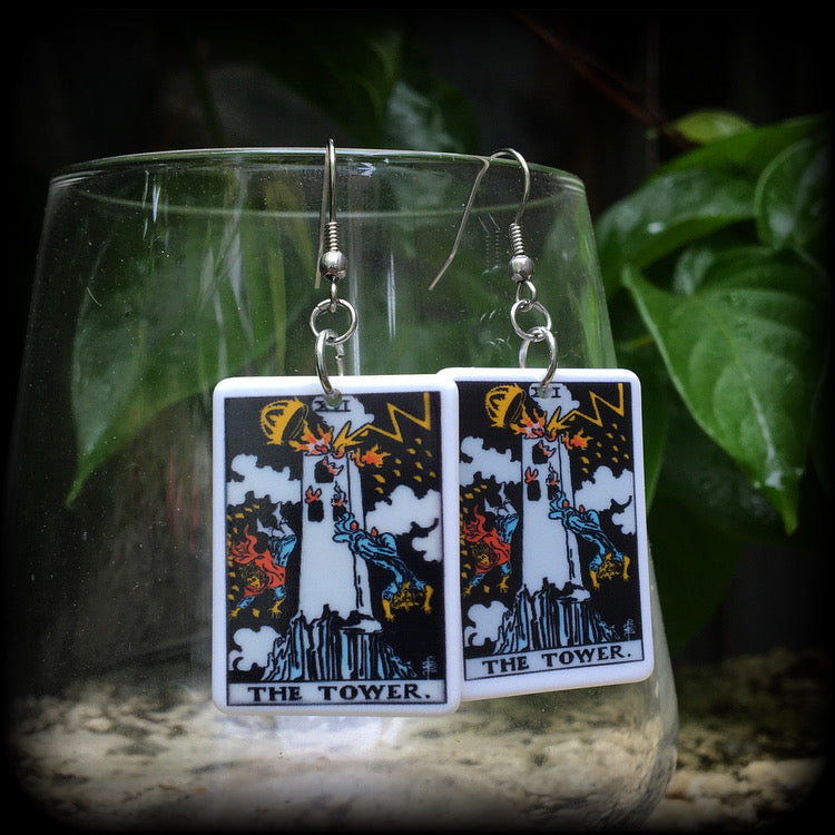 This pair of earrings features a classic Rider Waite ‘The Tower’ acrylic tarot card, measuring just over 6cms from tip to tip, and weighing only a gram or two each.

This pair has been made with stainless steel french hooks, for pierced ears.