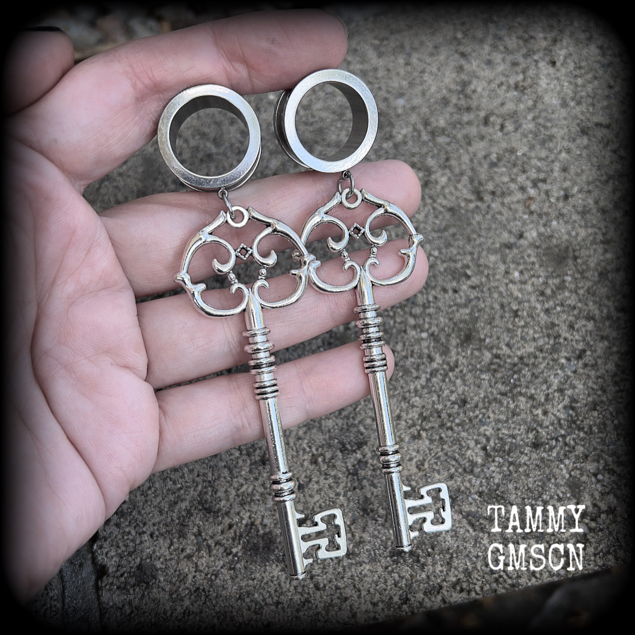 Antique silver key tunnel earrings