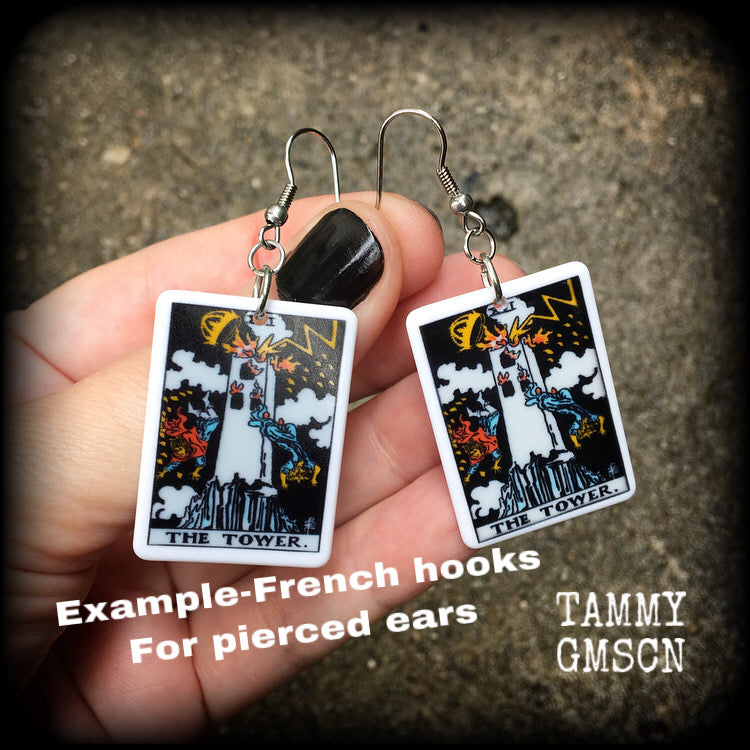 This pair of earrings features a classic Rider Waite ‘The Tower’ acrylic tarot card, measuring just over 6cms from tip to tip, and weighing only a gram or two each.

This pair has been made with stainless steel french hooks, for pierced ears.