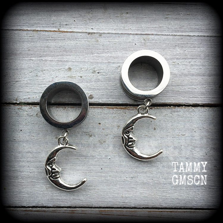 These gorgeous tunnel dangles feature whimsical antique silver crescent moons, are light weight, weighing in at 7 grams each and measure 4 cms from tip to tip.
This pair has been made with 9/16" (14mm) gauge surgical steel screw fit tunnels-suitable for stretched lobes.