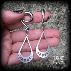 These gorgeous earrings feature stainless steel tear drop moon phase charms, measuring just on 7cms from tip to tip, and weighing only 8 grams each, not too heavy.

These gauged earrings have been made on 2 gauge (6mm) surgical steel full curl hooks, to be worn in stretched lobes.