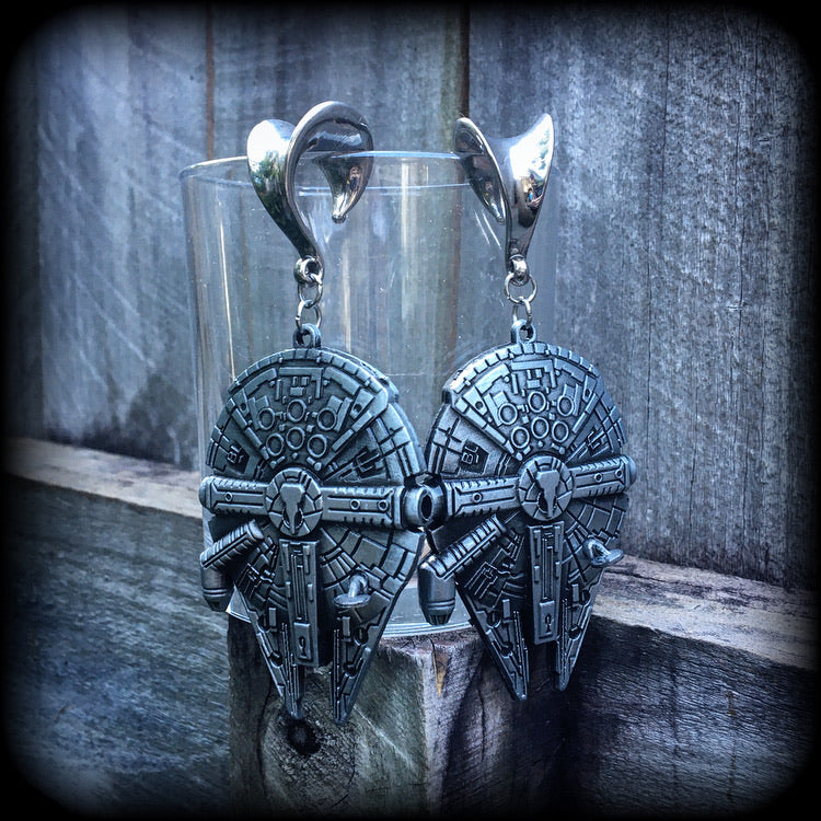 These Star Wars Millennium Falcon ear hangers are nice and heavy at 41 grams a piece, and nice and dangly at 10cms from tip to tip, these are BIG!!!!

This pair has been made on 5/8" gauge (16mm) surgical steel saddles, suitable for stretched lobes.
