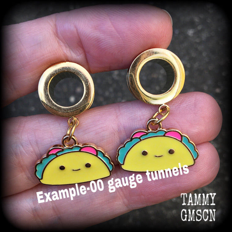 This adorable pair of earrings features cute little happy taco charms, measuring approx 3cms from tip to tip and weighing only a few grams each. These earrings are too cute!

This pair has been made with 10mm surgical steel tunnels, for stretched lobes.