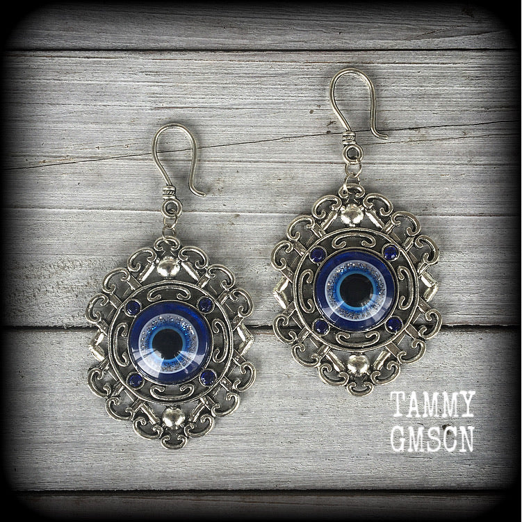 Evil eye earrings-Esoteric tunnel earrings