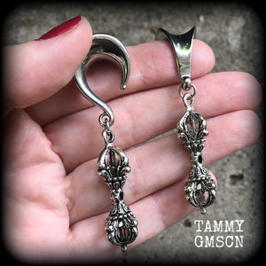 Silver ear weights 