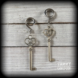 Antique silver key gauged earrings