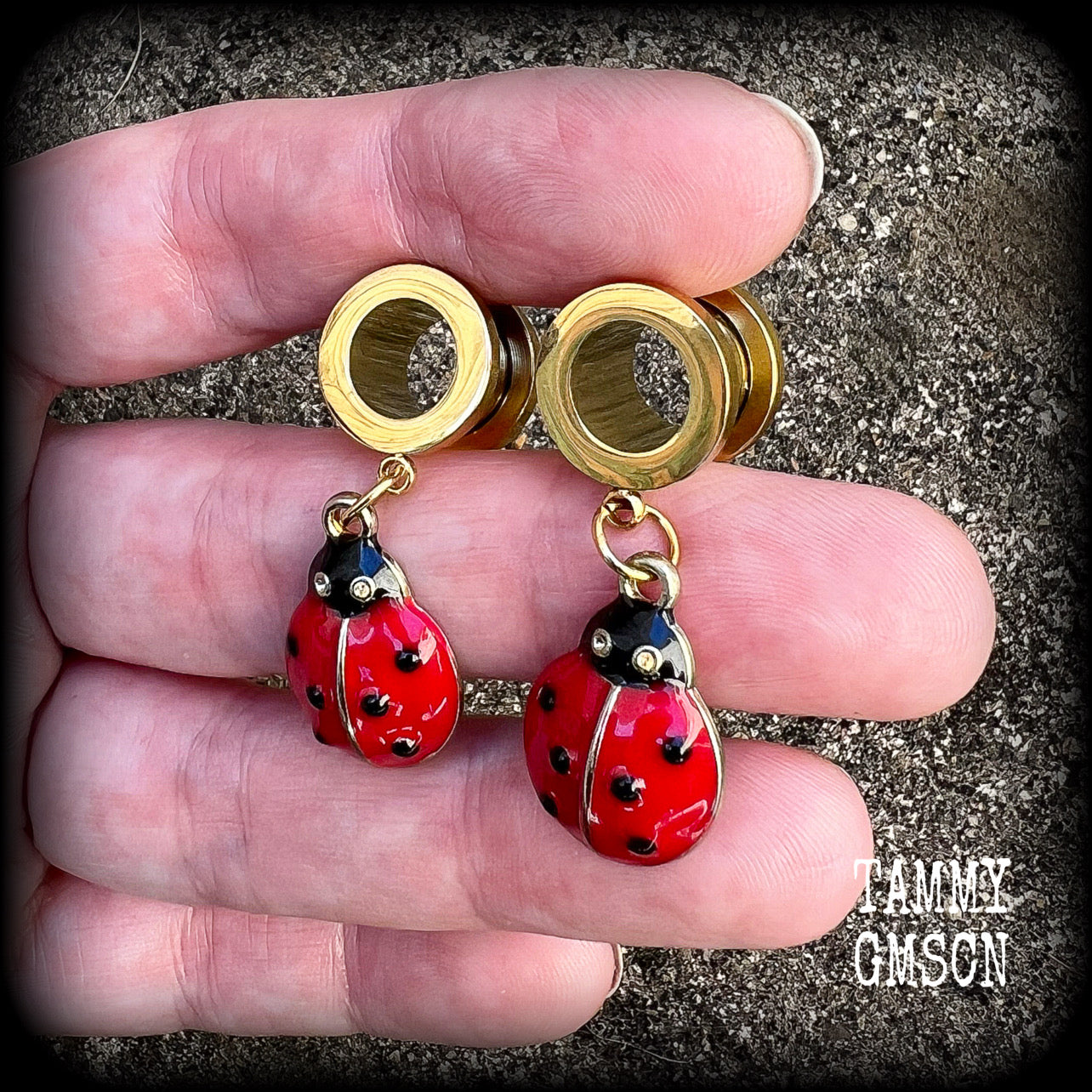 Ladybug tunnel earrings