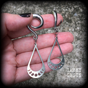 These gorgeous earrings feature stainless steel tear drop moon phase charms, measuring just on 7cms from tip to tip, and weighing only 8 grams each, not too heavy.

These gauged earrings have been made on 2 gauge (6mm) surgical steel full curl hooks, to be worn in stretched lobes.