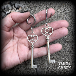 Antique silver key gauged earrings