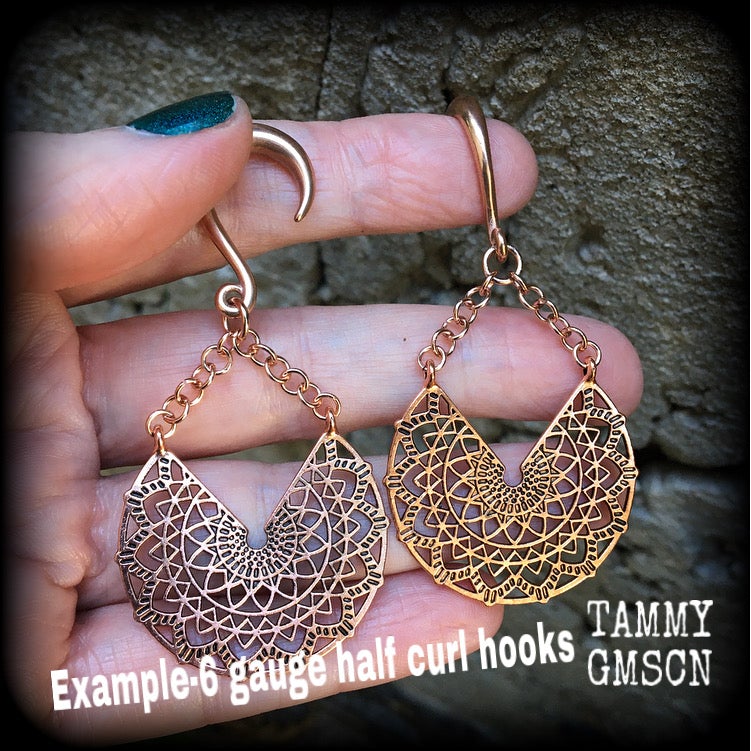 Rose gold tone mandala gauged earrings-Cradle weights