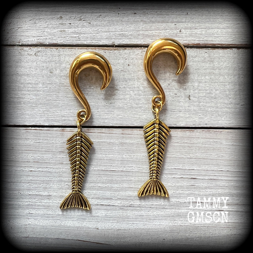 Skeletal mermaid tail gauged earrings