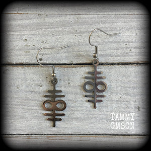 These stainless steel double 'Sigil of Sulphur' earrings are nice and petite, measuring just 4.5 cms from tip, weighing only a few grams each.
This pair has been made with french hooks suitable for pierced ears.