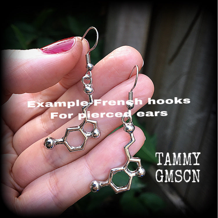 These cute little antique silver Serotonin molecule earrings measure just under 5cms from tip to tip, and are super light weight at only a few grams each.

This pair have been made with stainless steel french hooks, to be worn in pierced ears.