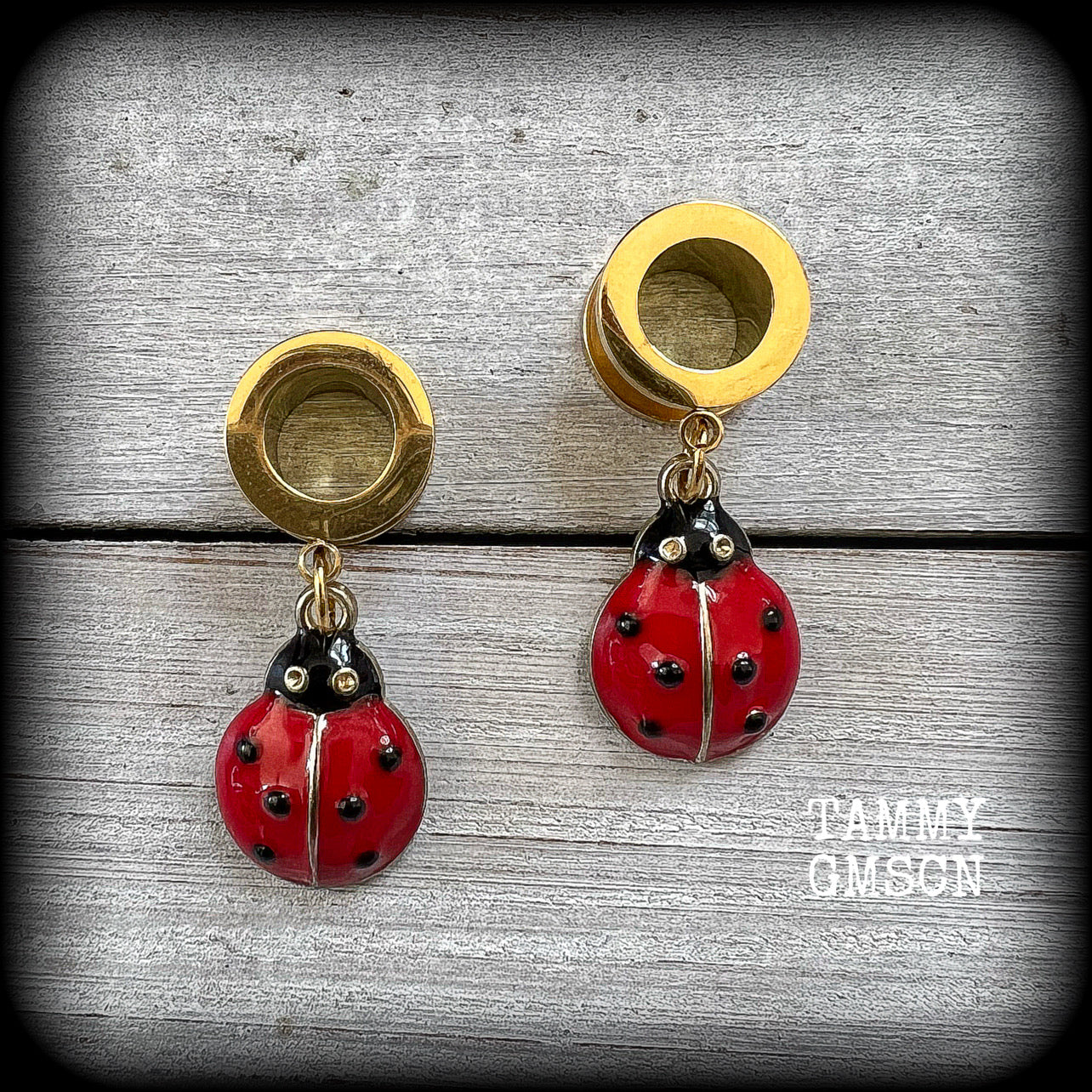 Ladybug tunnel earrings