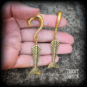 Skeletal mermaid tail gauged earrings