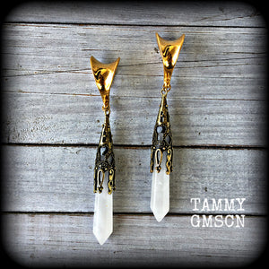 These gorgeous gothic gemstone gauged earrings feature beautiful cloudy quartz and antique bronze gemstone points, measuring just over 10 cms from tip to tip, and weighing approx 15 grams each.
These earrings have been made on 5/8" gauge (16mm) surgical steel saddles, to be worn in stretched lobes.
