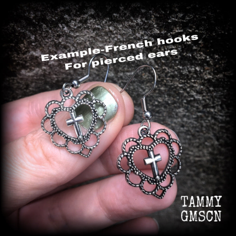 This pair of earrings features an ornate sacred heart with christian cross, nice and lightweight at just 2 grams a piece, and not too dangly, measuring just on 4cms from tip to tip.
This pair has been made with stainless steel french hooks, for pierced ears.
