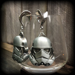 Measuring approx 8cms from tip to tip, these Storm Trooper ear hangers are nice and big, and nice and dangly, weighing around 26 grams each.

This pair has been made on 5/8" gauge (16mm) surgical steel saddles, suitable for stretched lobes.