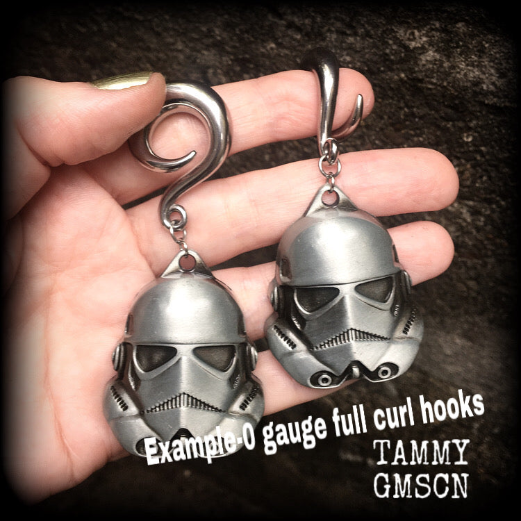 Measuring approx 8cms from tip to tip, these Storm Trooper ear hangers are nice and big, and nice and dangly, weighing around 26 grams each.

This pair has been made on 5/8" gauge (16mm) surgical steel saddles, suitable for stretched lobes.