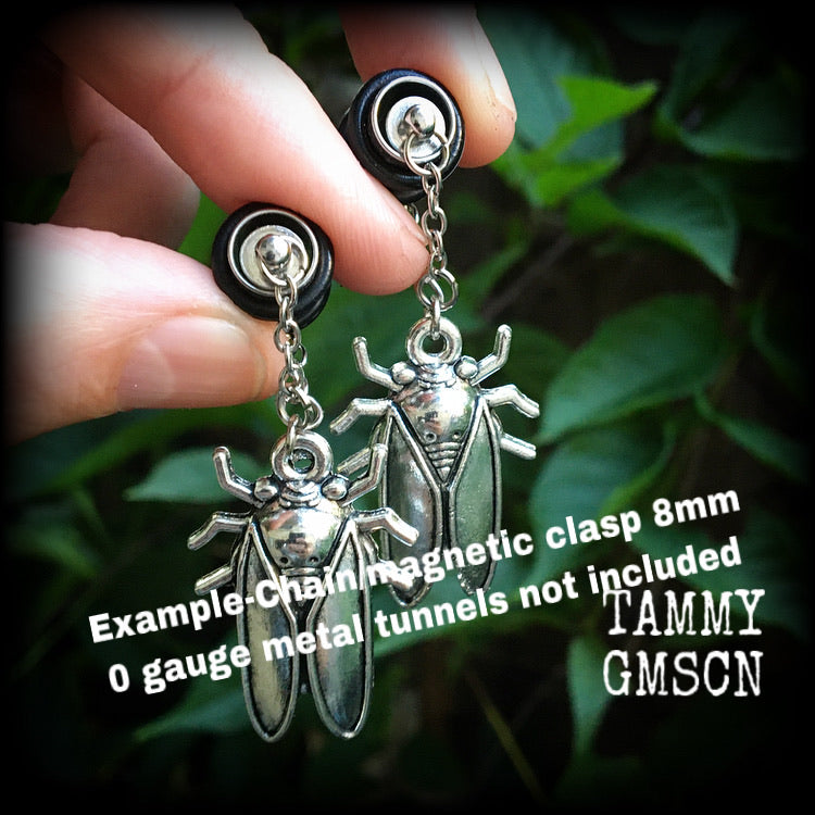 Insect tunnel earrings 