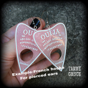These gorgeous oversize pastel goth acrylic planchette earrings are big and dangly, weighing in at 8 grams each and measuring just under 8cms from tip to tip.

This pair have been made on stainless steel french hooks, suitable for pierced ears.