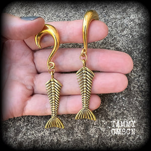 Skeletal mermaid tail gauged earrings