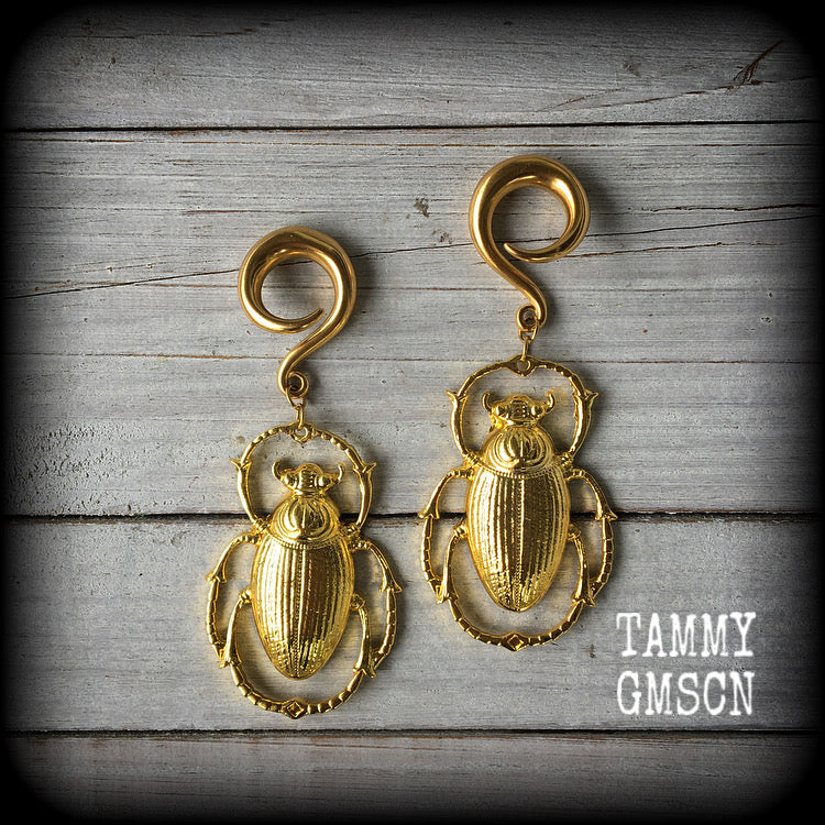 Scarab beetle ear hangers Scarab beetle ear hangers Insect ear weights 2 gauge ear weights Stretched lobes Body jewelry 6g 2g 0g 00g 1/2" 9/16" 5/8" 3/4" 7/8" 1" 1.10" 1.18" Stretched ears gauged ears Stretched lobes Gauged earrings
